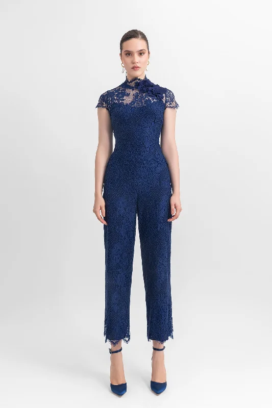 High-neckline lace top with flower details on the side, paired with straight-cut ankle-length pants